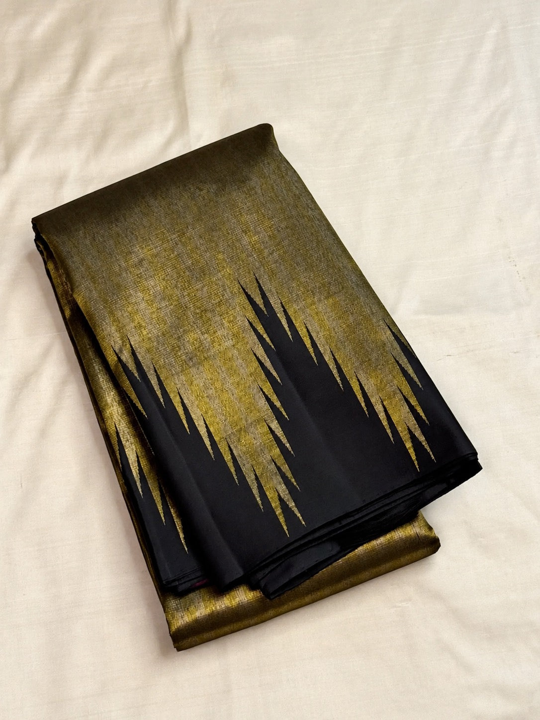 Black and burnished gold Kanjivaram saree, styled view