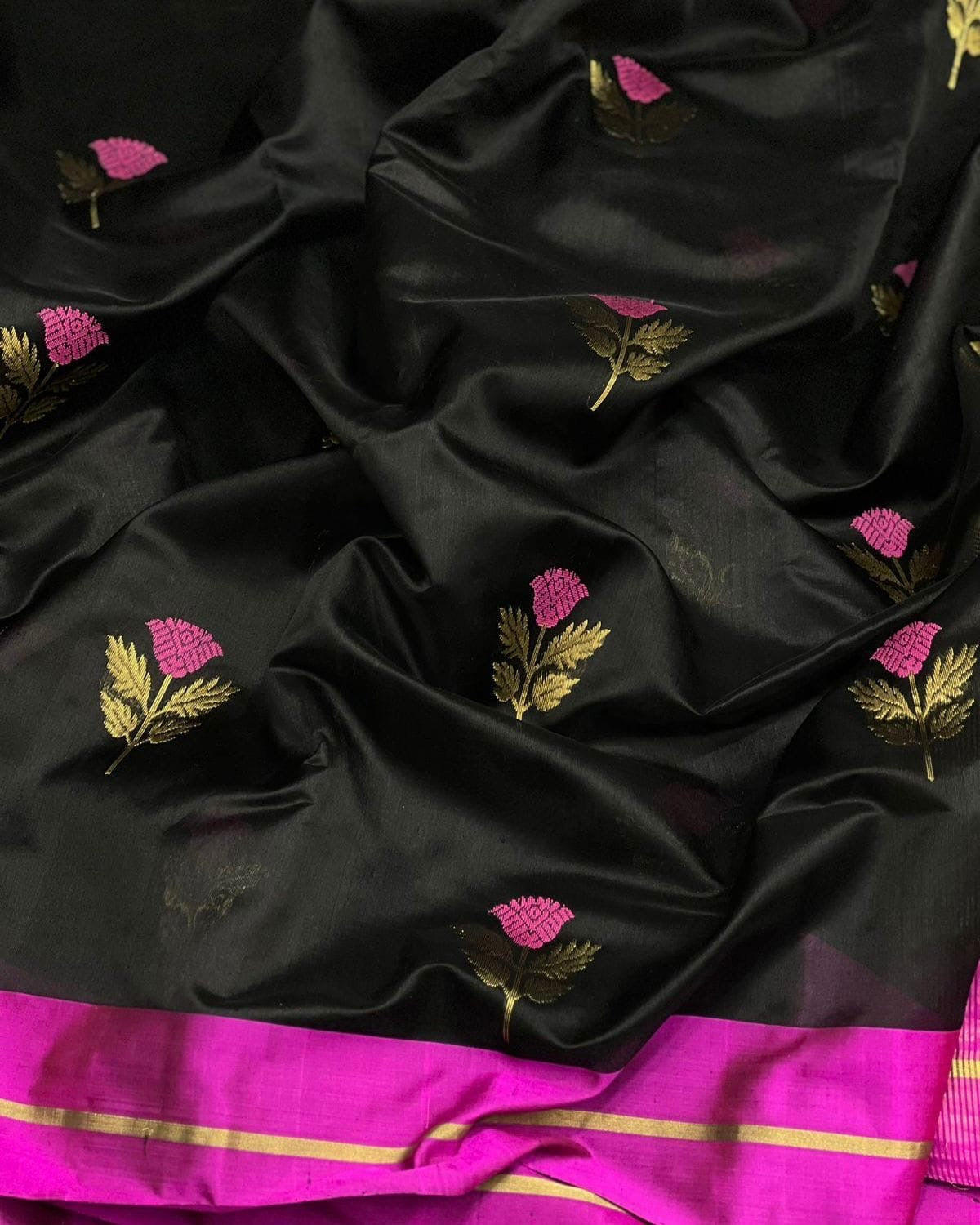 Black Chanderi silk saree with scattered fuchsia pink floral buttas