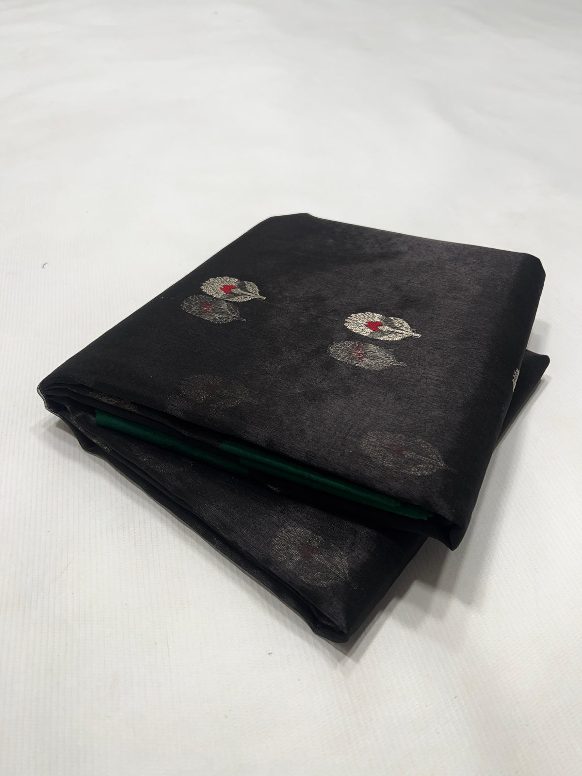 Black Chanderi saree with emerald green contrast border