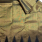 Black and gold handwoven ettukol saree, close view of the weave