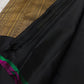 Full black Kanjivaram saree with panel border, folded view