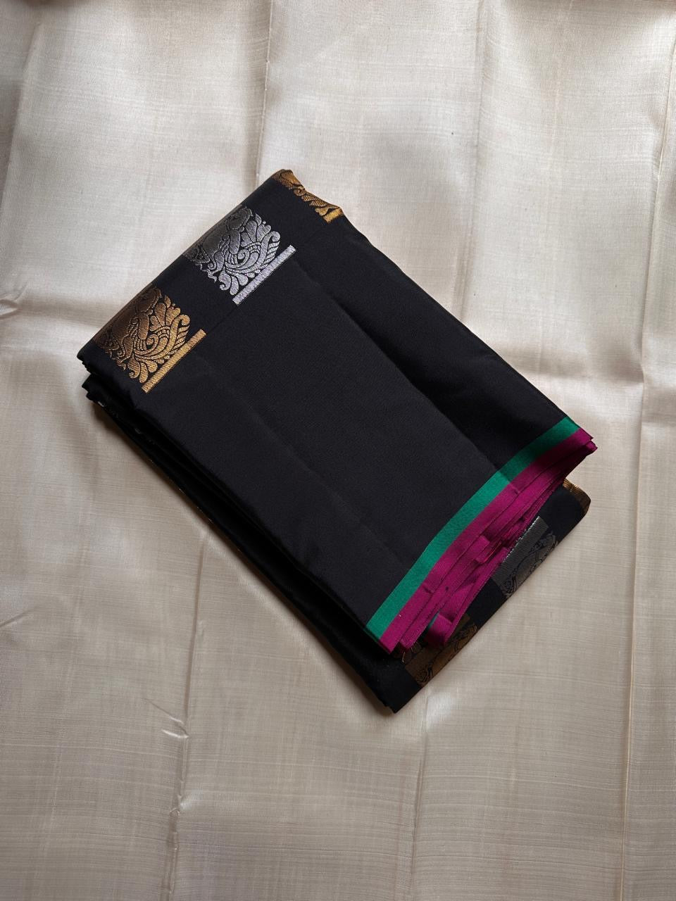 Black handwoven pure silk Kanjivaram saree with gold-silver panel and black border — Idam Living