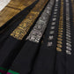Matching alternating gold-silver zari pallu on black ground