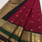 Fresh-green Butta KanchiPattu saree with black-green peacock zari border