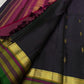 Lightweight black Kanjivaram with traditional gold buttas.