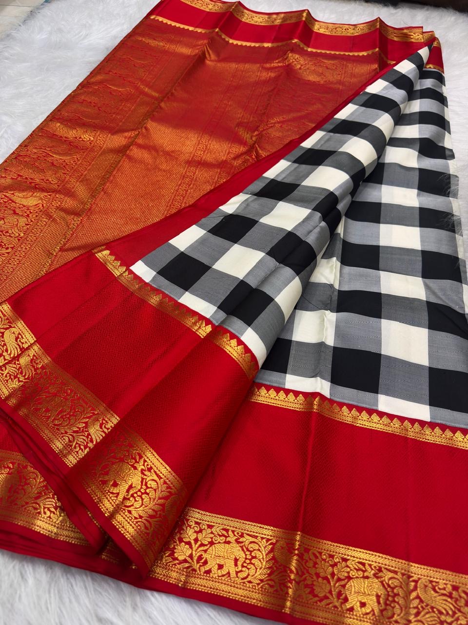 Black, Grey and Ivory pure silk KanchiPattu saree, Kanchi Kattam weave with Pillar-Box Red border — border detail
