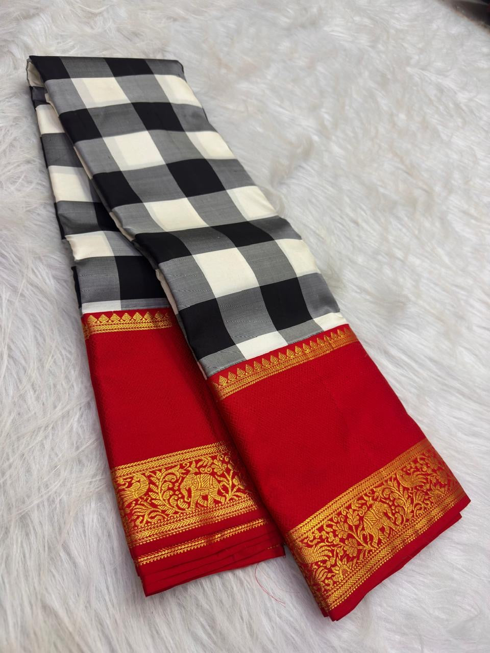 Black, Grey and Ivory pure silk KanchiPattu saree, Kanchi Kattam weave with Pillar-Box Red border — pallu detail