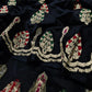 Close view of black Chanderi silk saree with ornamental gold-toned border and multicolour woven details
