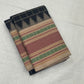 Dense kamalam and geometric motifs on multi-colour pattupet border of black Kanchipuram silk saree — Idam Living