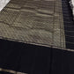 Black Pure Kanchipuram silk saree pallu with dense zari woven pattern and border, shipped from New Jersey USA.