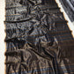 Silver-gold pinstripe pattern deepening toward gold near pallu, black Pattu Silk Chanderi saree