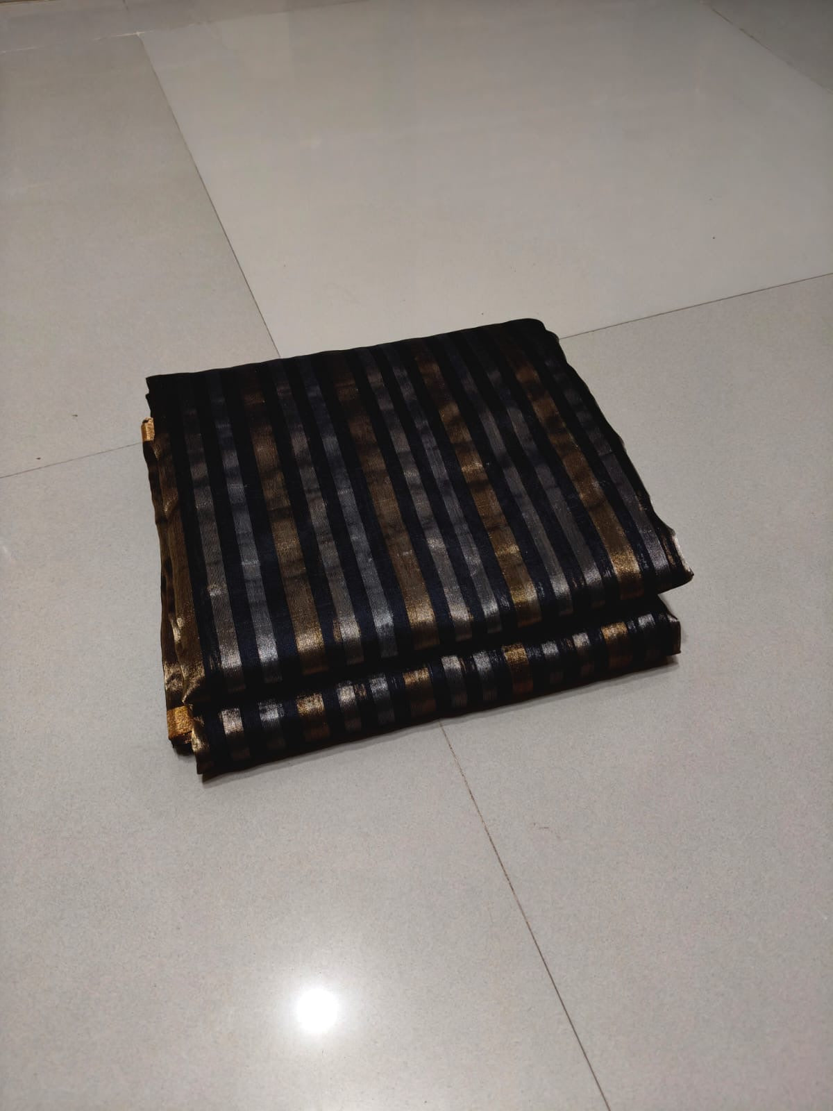 Black Pattu Silk Chanderi saree folded, full view