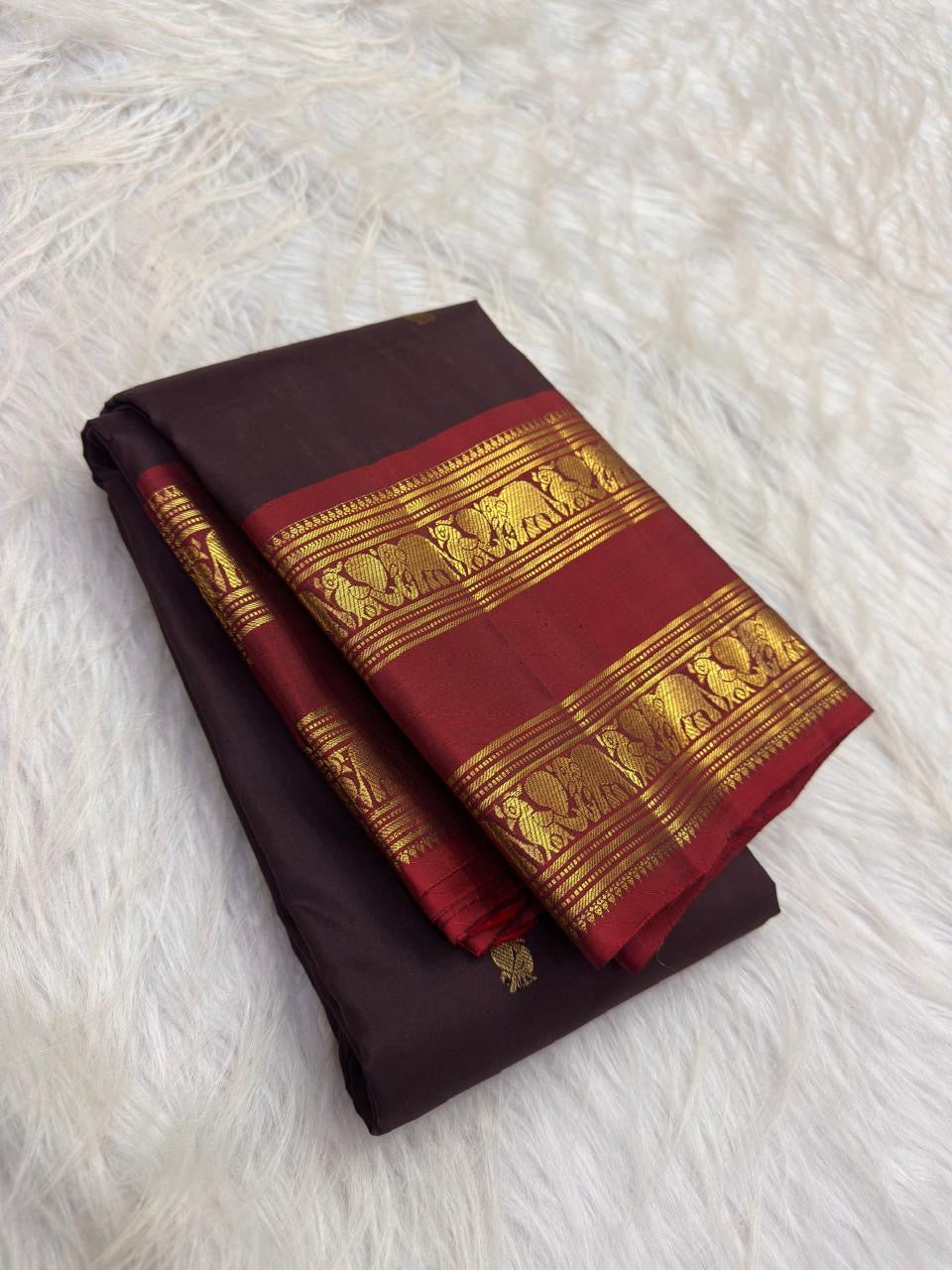 Deep Kanchana brown Pure Silk Kanjipuram Rettapet saree with Arakku red kamalam gold zari border