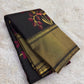 Black pure silk Kanjivaram saree with large floral jaal and layered botanical coloration.