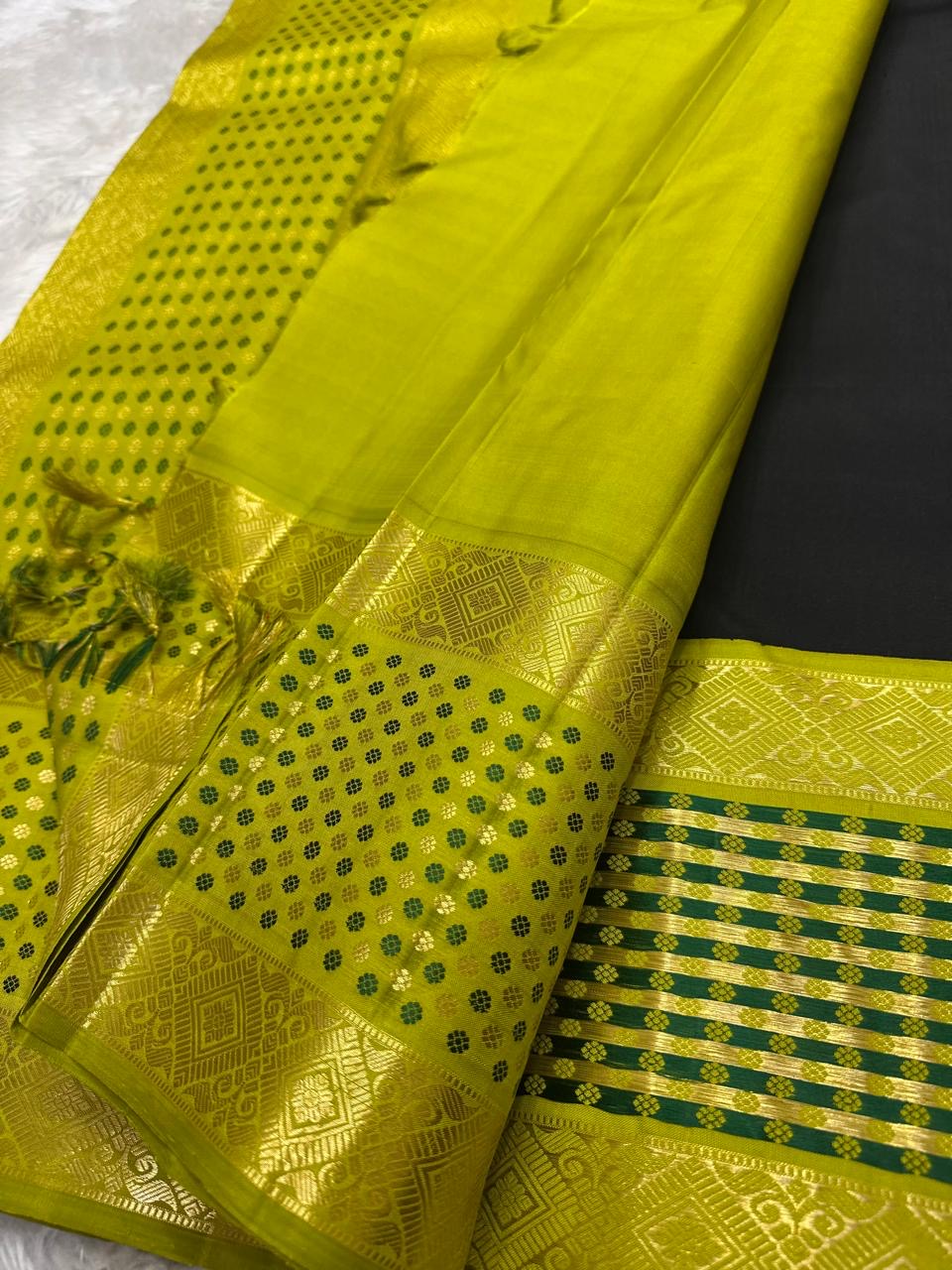 Black Handwoven Pure Silk Kanchi Pattu Saree with Olive Gold Rettapet Border