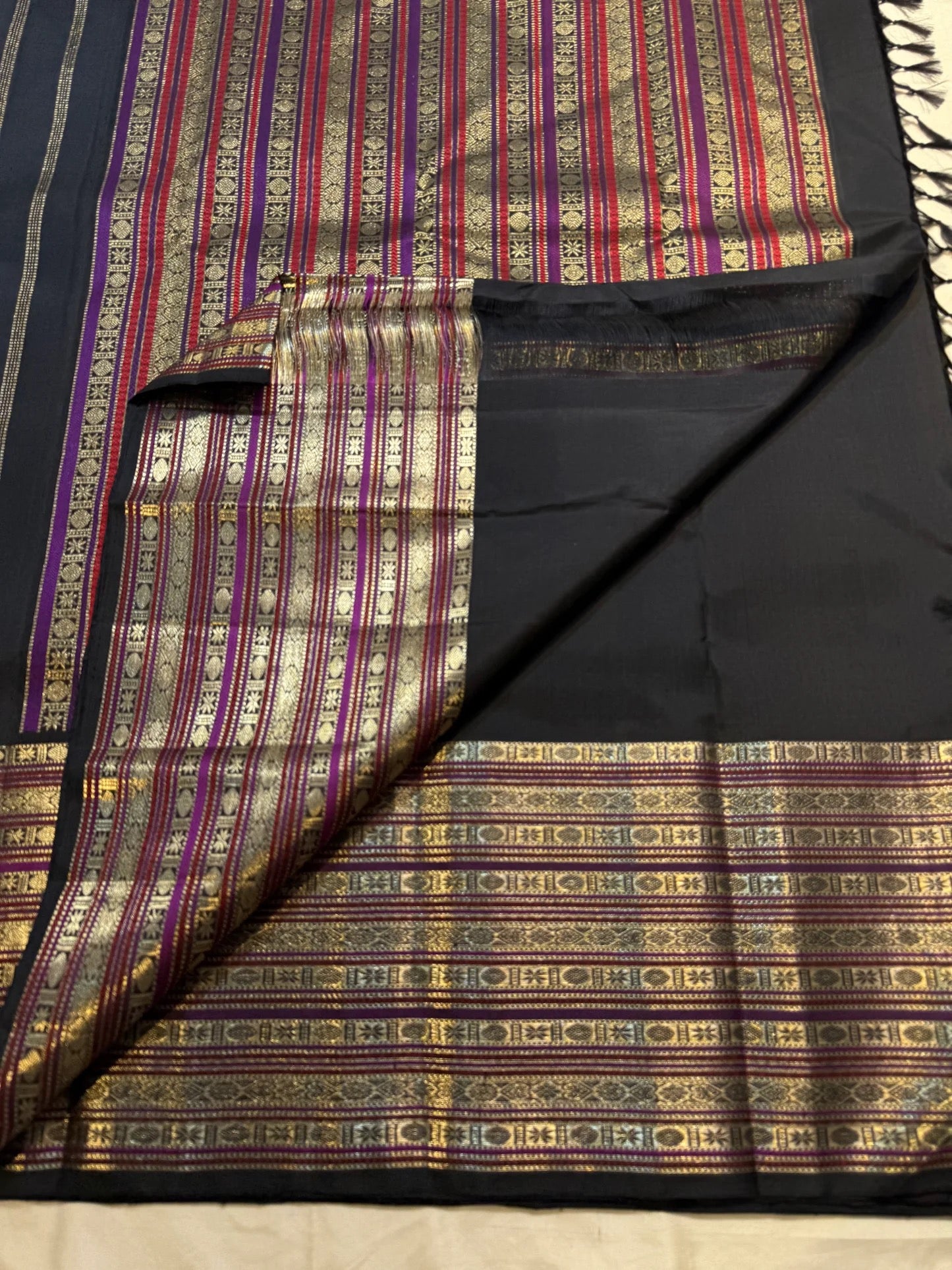 Black silk with gold zari floral-jaal motif detail