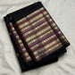 Full black Kanchipuram saree with Varisaipet border, folded view