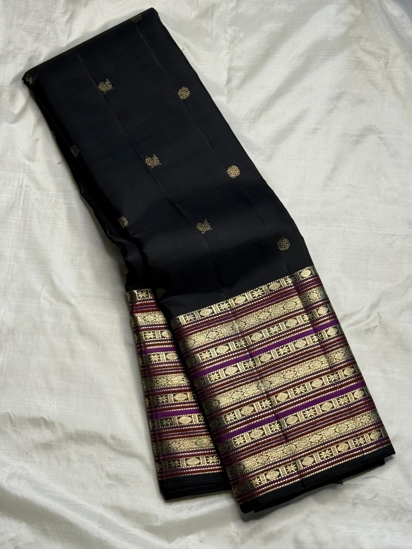 Black handwoven pure silk Kanchipuram saree with layered Varisaipet border — Idam Living