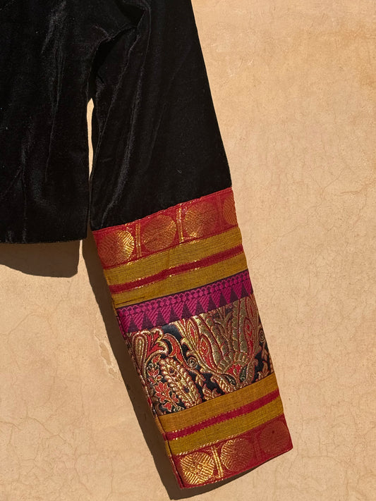 Front view of soft pink pure Kanchipuram silk saree draped with subtle gold dot pattern