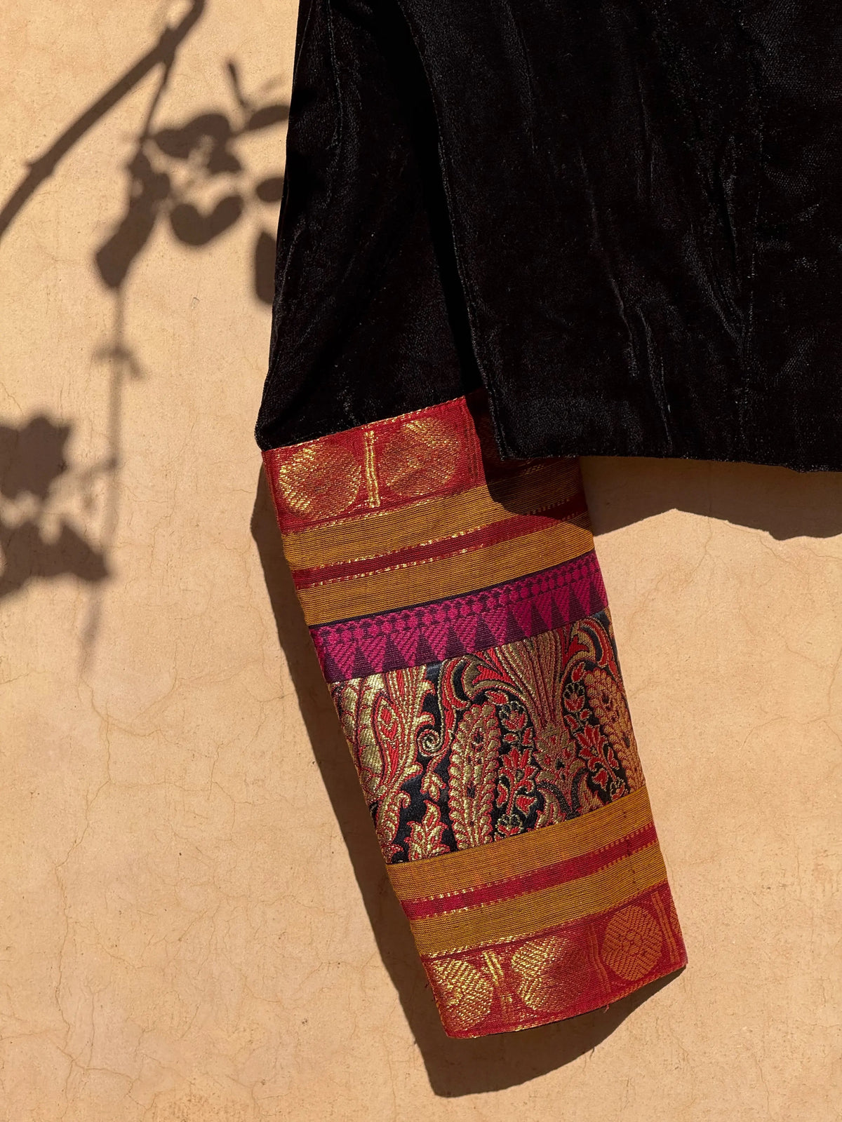 Black velvet patchwork blouse with Banarasi Kimkhwab silk sleeves, close view
