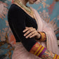 Black velvet saree blouse with Banarasi Kimkhwab silk sleeves by Idam Living