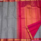 Vintage-style black and white checked Kanchipuram silk with saturated pink contrast border