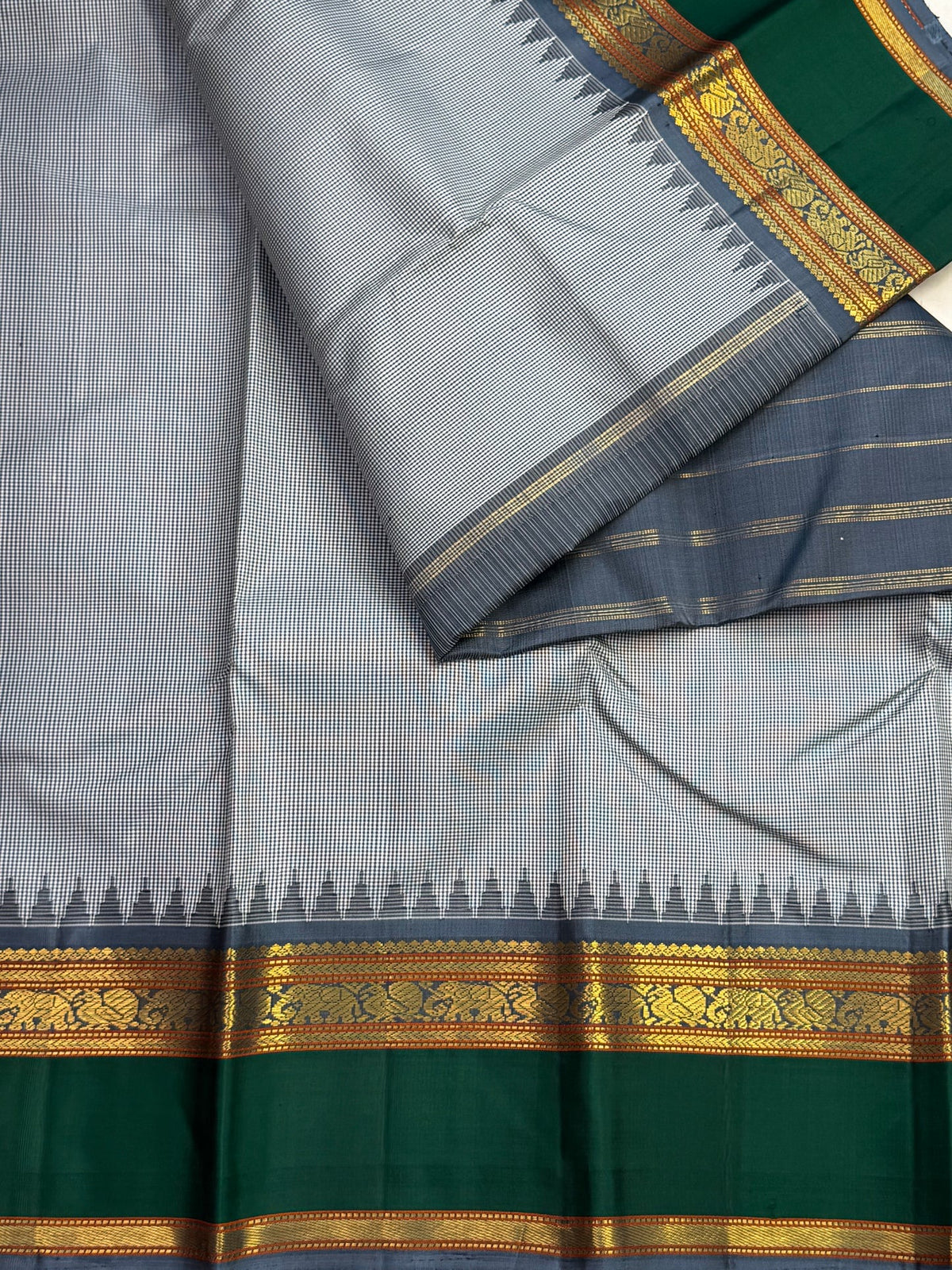 Black and white miniature checks forming a grey body on handwoven Kanjivaram silk