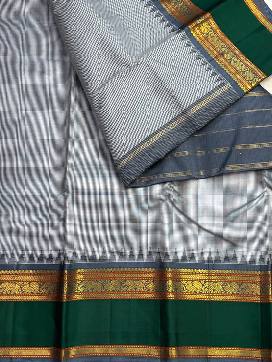 Black and white miniature checks forming a grey body on handwoven Kanjivaram silk