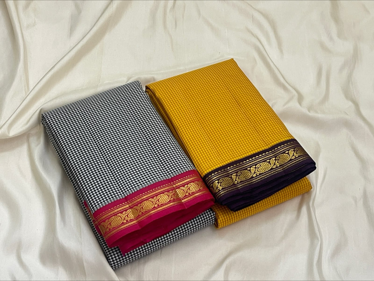 Black and white Podi Kattam Pure Silk Kanchipuram saree with vivid deep pink zari border