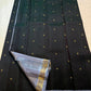 Grey pavun coin motif Korvai border close-up