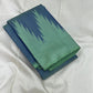 Folded Pure Kanchipuram silk saree in mint and deep blue with bold thazampoo reku contrast pattern