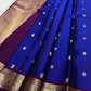 Royal Blue Kanjivaram body with traditional spaced antique-gold zari motifs.