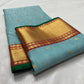 Blue Chanderi saree with gold buttas and red border detail