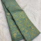 Peacock and floral gold zari detail, aqua Kancheepuram Vanasringaram saree