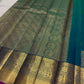 Blue-green Pure Silk Kanchipuram saree with Rani-pink edge, Koodu Mayil motifs and ornate Chakram panels
