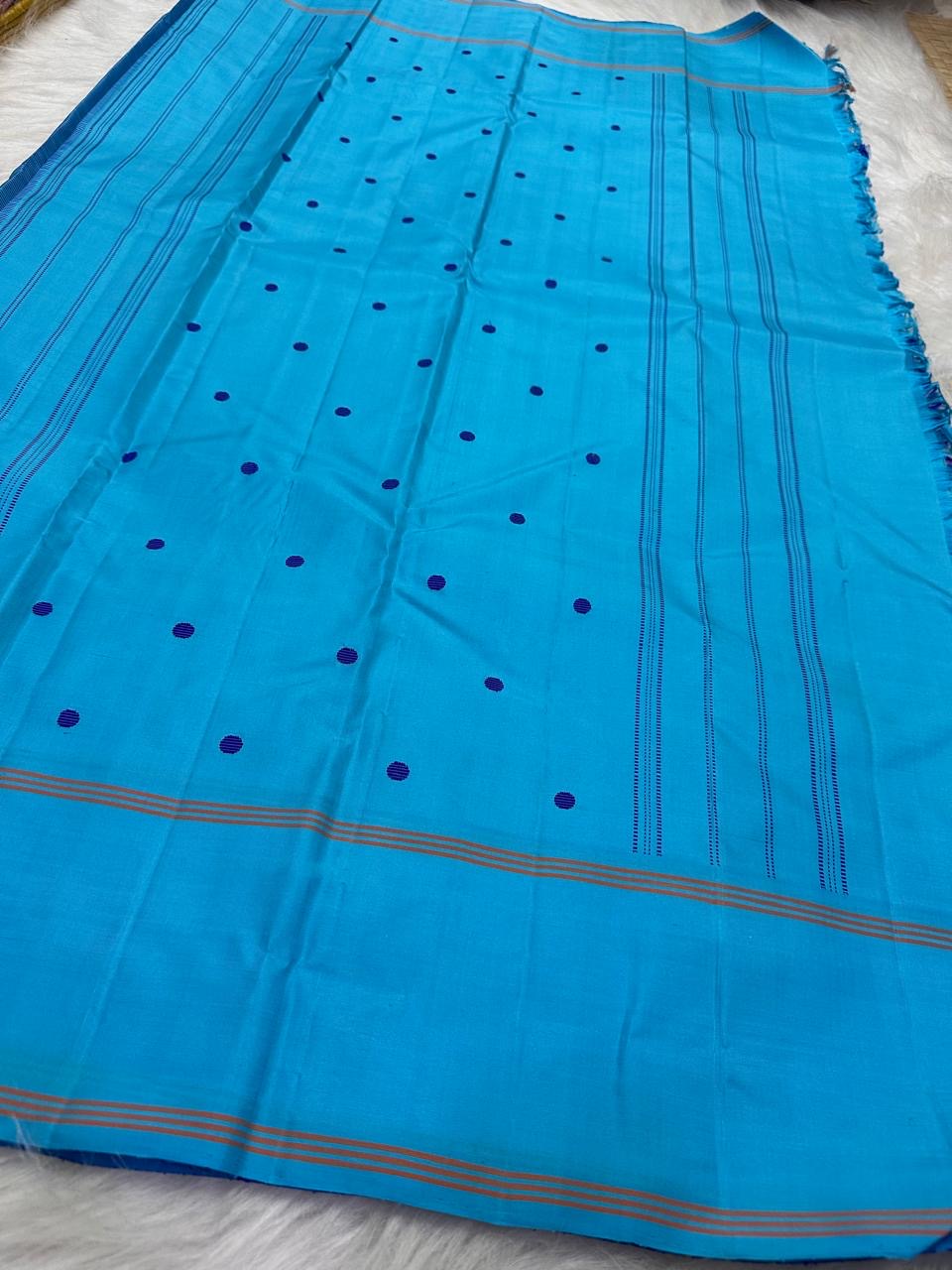 Mayil Kazhuthu blue-green border detail, royal-blue Kanjipuram saree