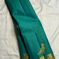 Blue-green pure silk Vairaoosi saree with finely woven antique-gold ornamental border.