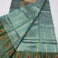 Handloom sea glass blue Pattu Silk Chanderi saree draped to show body and border