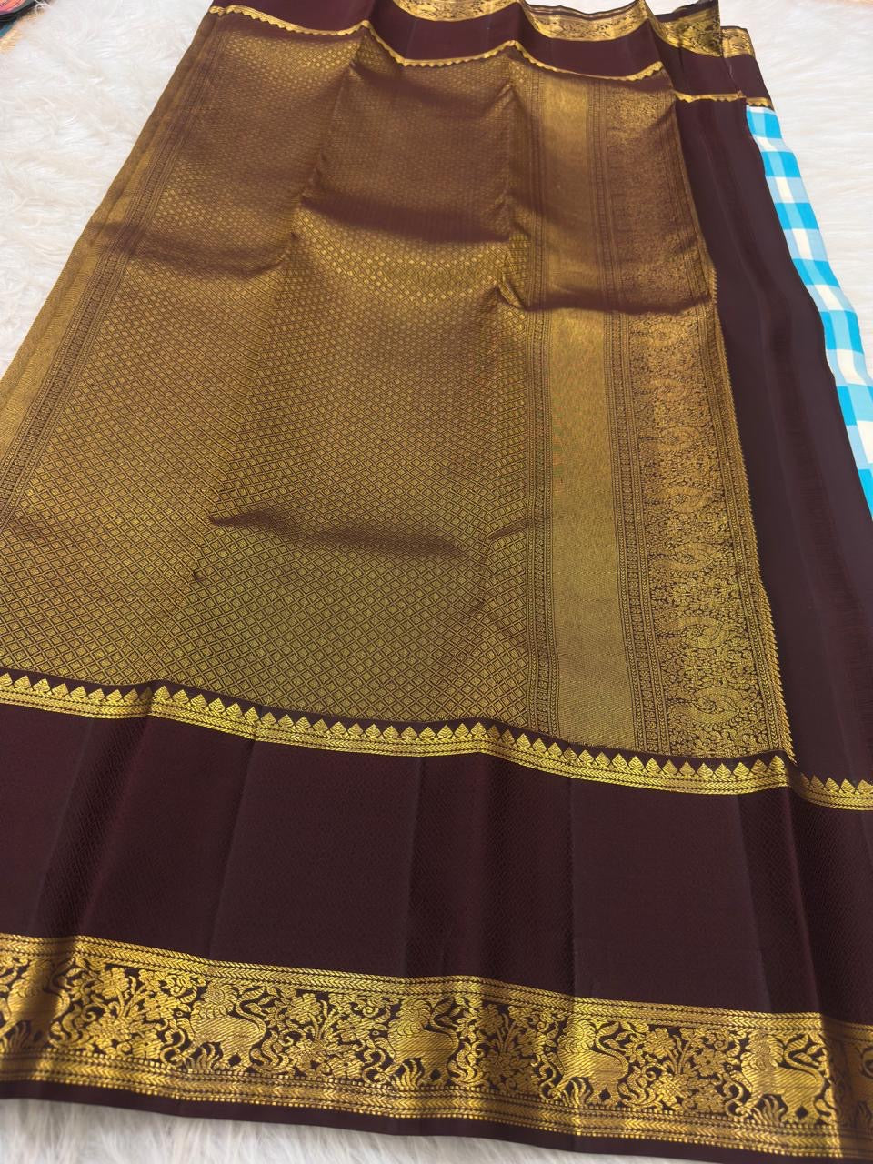Blue and ivory Paalum Pazhamum Pure Silk Kanchipuram saree.