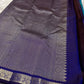 Indigo pallu section with silver zari woven border and smooth silk finish