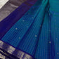 Pure Kanchipuram Silk Saree laid out in blue muthu kattam checks with indigo zari woven border, available in the USA