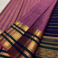 Twisted gold-zari bands on royal blue Kanchipuram silk.