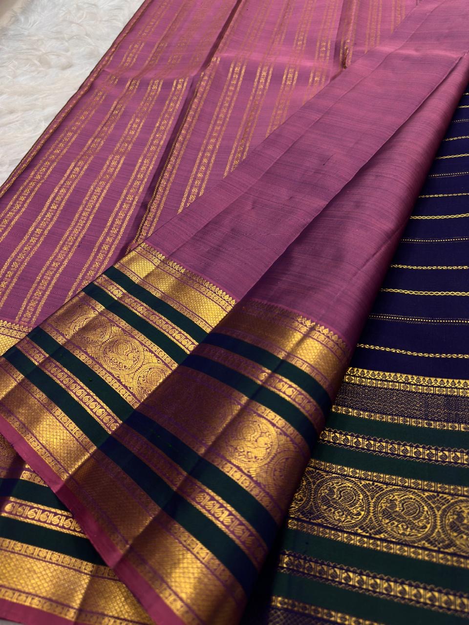 Twisted gold-zari bands on royal blue Kanchipuram silk.