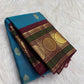 Handwoven blue Kanjivaram saree with Deep Maroon and Peacock Green contrast border