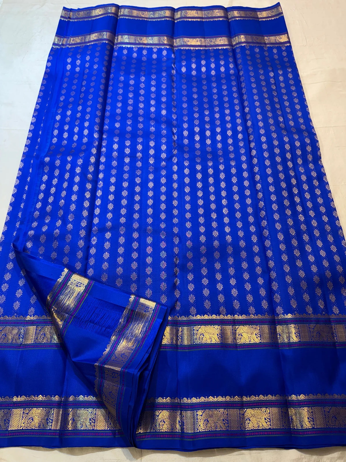 Royal Blue Kanjivaram saree with traditional Yanai elephant motif zari border