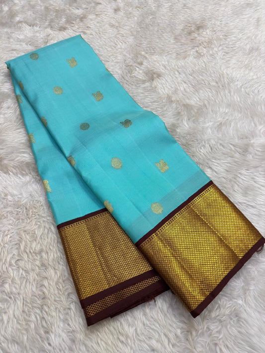 Blue Lagoon and Deep Maroon Handwoven Pure Silk Kanjivaram Saree with Mayil Kann Korvai Border