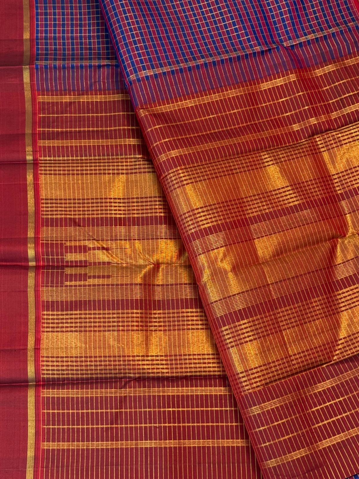 Cobalt blue and maroon handwoven Pure Silk Kancheepuram Kanchi Kattam saree with fine gold grid and red Rettapet border, full saree view