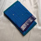 Folded Pure Kanchipuram Silk Saree in blue muthu kattam checks with small silver motifs and indigo zari woven border