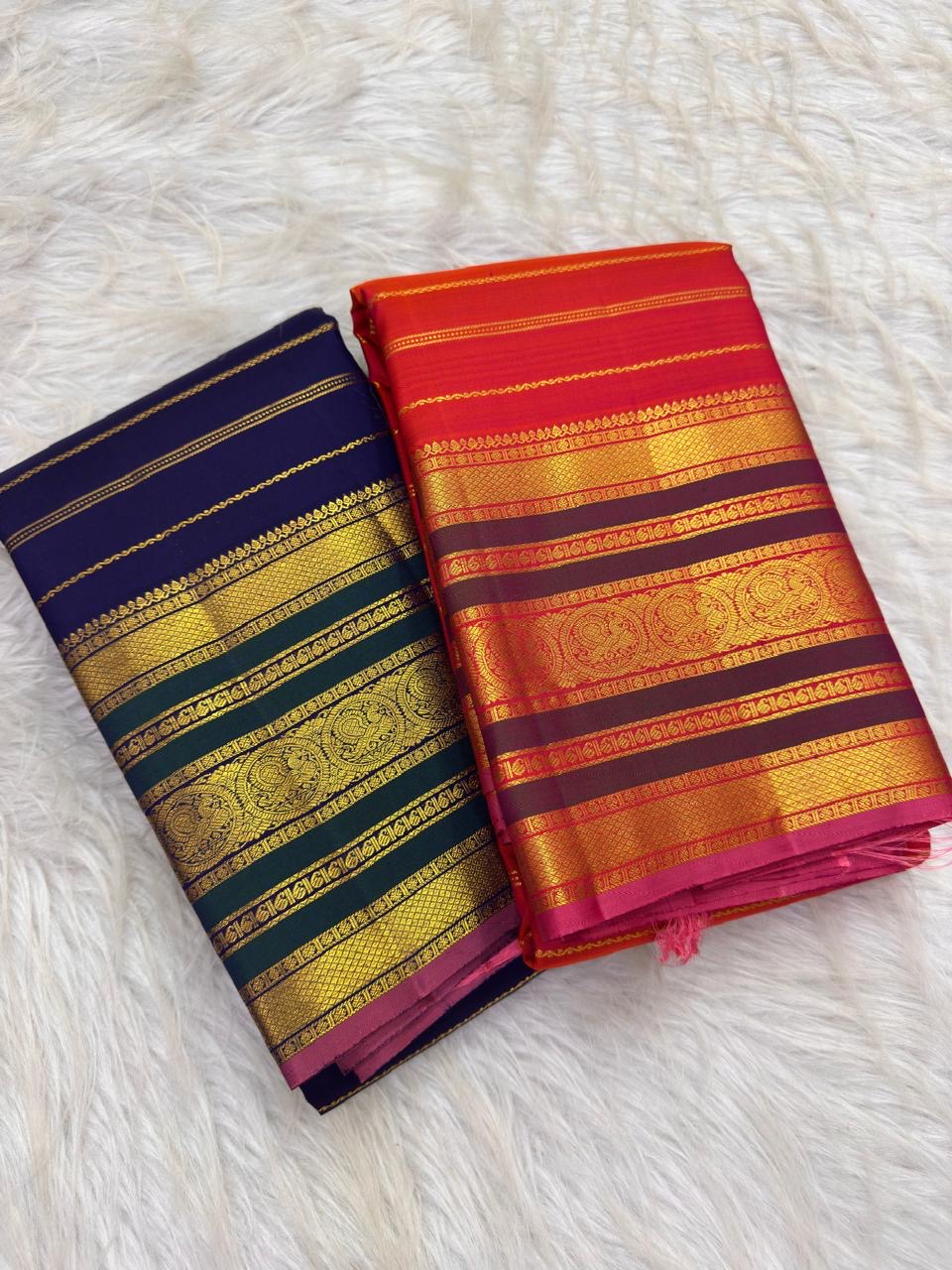Royal blue Pure Silk Kanchipuram saree with an ornate deep-green border.