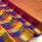 Close view of Paalum Pazhamum checks with individually woven antique-gold zari motifs.